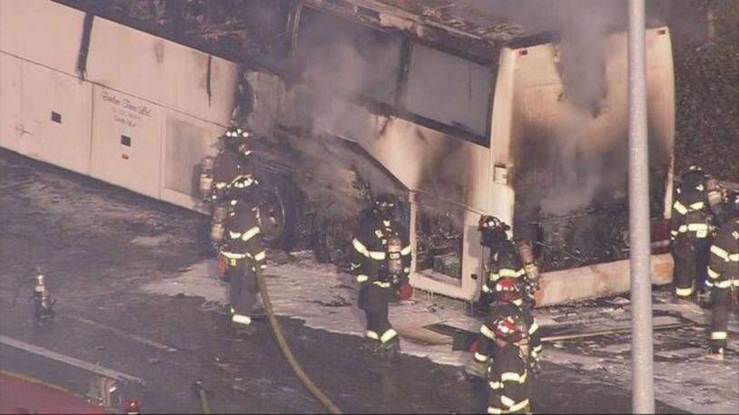 A bus carrying members of the Stanford track team caught fire on I-5 in Seattle on Friday.  (Photo: KIRO7.com)