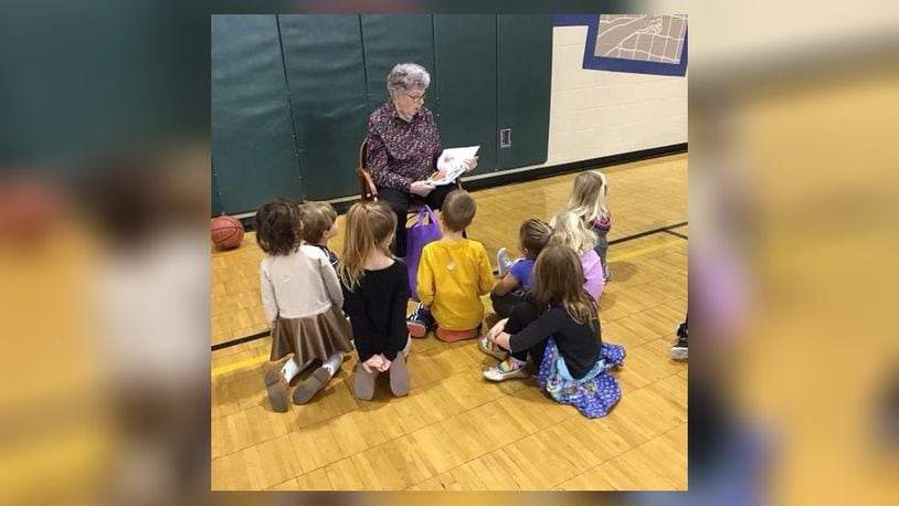 Delcie Doose, 88, of Liberty Twp., reads to children at the East Butler County YMCA. Because of her love of literacy and reading, the YMCA will dedicate Delcie's Corner in the children's room. Delcie died on Jan. 26, 2021, of a heart attack. PROVIDED