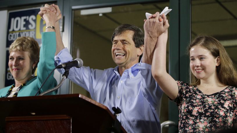 In this April 26, 2016, file photo, former Congressman Joe Sestak, center, his wife Susan Sestak, left, and daughter Alex Sestak react after speaking to supporters gathered outside his campaign headquarters in Media, Pa. Sestak has become the latest Democrat to enter the presidential race.