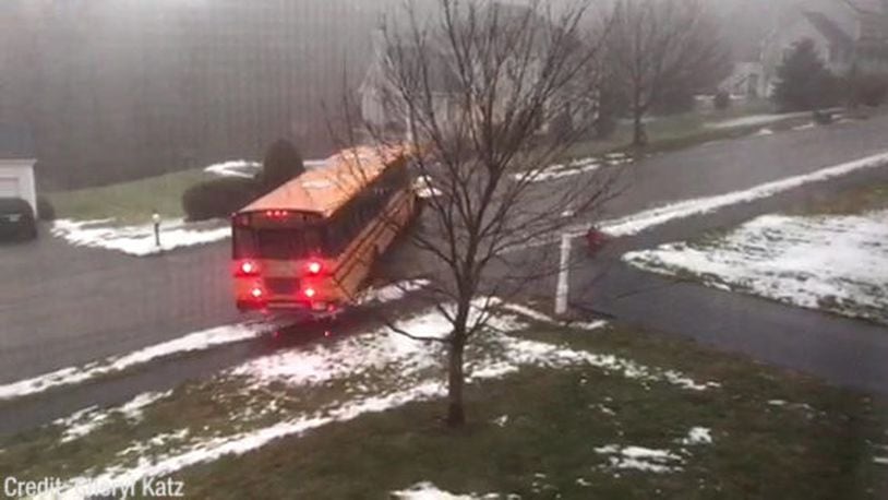 A school bus with children on board slid down an icy road in Massachusetts. No one was injured.