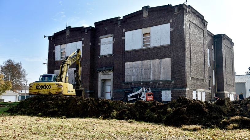 Demolition is slated to start this week in the old Taylor School building in the Lindenwald neighborhood of Hamilton.  Preliminary work was underway Tuesday, Nov. 19. NICK GRAHAM/STAFF