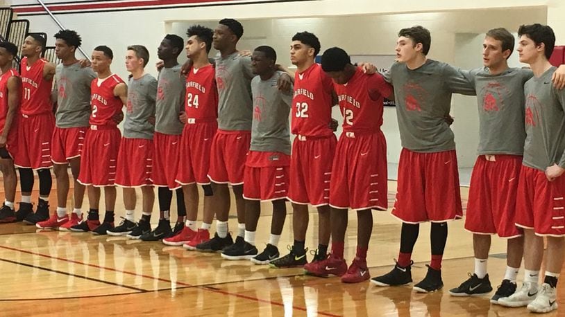 The Fairfield Indians stand for the National Anthem before Saturday’s Division I sectional game against Northwest at Lakota West. RICK CASSANO/STAFF