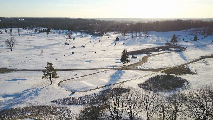 Community Golf Course is blanketed in snow. The low winter sun casts long shadows from trees standing along the fairways as seen from SKY 7. ERIC DIETRICH / STAFF