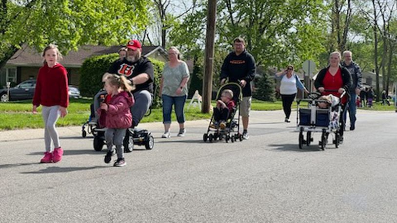 Joe Nuxhall Miracle League Opening Day Parade will kick off at 10 a.m. April 20 from Sacred Heart Church and winds its way to the Joe Nuxhall Miracle League Fields for a special on-field celebration. For more information, go to nuxhallmiracleleague.org. Pictured is some of last year's parade participants.  AMY BURZYNSKI/STAFF