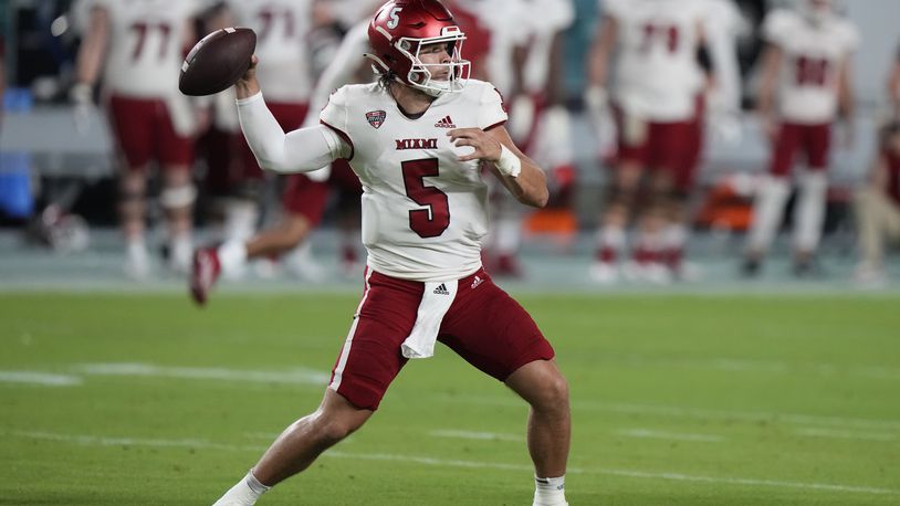 Miami (Ohio) quarterback Brett Gabbert throws a pass during the first half of an NCAA college football game against Miami, Friday, Sept. 1, 2023. Gabbert passed for two touchdowns and rushed for a pair of scores on Saturday vs. Western Michigan. (AP Photo/Wilfredo Lee)