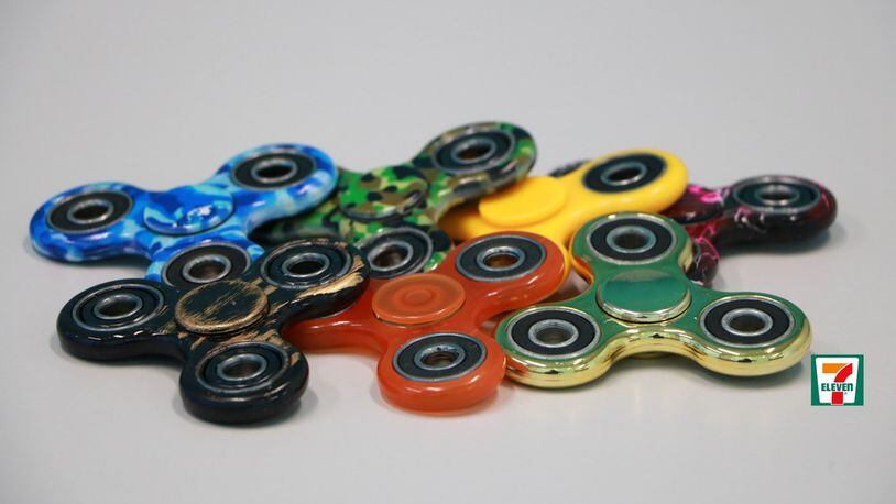 Flying off the shelves, 7-Eleven stores sell Fidget Spinners, the popular new toy designed to calm nerves, ease anxiety and provide hours of entertainment. (PRNewsfoto/7-Eleven, Inc.)