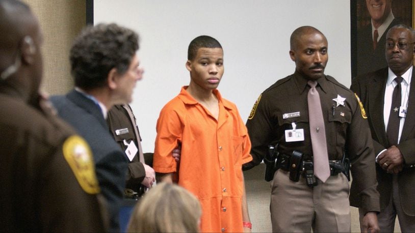 Lee Boyd Malvo is brought to court in Virginia Beach Oct. 22, 2003, to be identified by a witness during the capital murder trial of John Allen Muhammad. Malvo, then 17, and Muhammad, who was 41, were known as the Beltway snipers, a pair of killers who targeted more than a dozen victims over a three-week span in the fall of 2002, killing 10 people. Malvo, now 33, has been granted a new sentencing hearing in four Virginia slayings for which he was sentenced to life without parole.