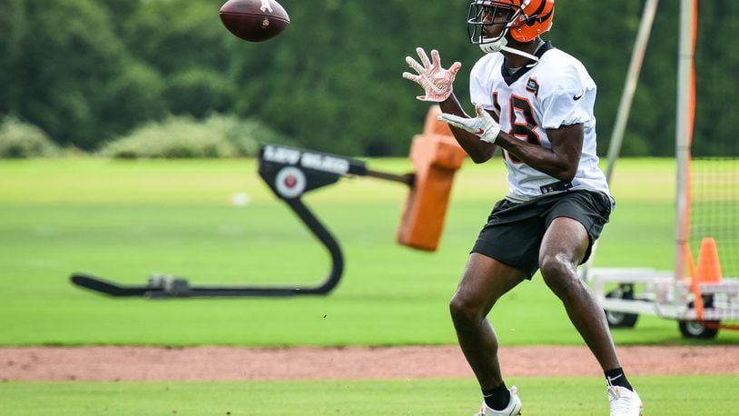 Bengals’ wide receiver A.J. Green catches a pass during organized team activities Tuesday, May 22, 2018, at the practice facility near Paul Brown Stadium in Cincinnati. NICK GRAHAM/STAFF