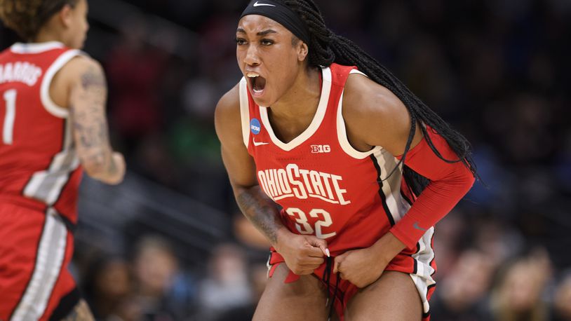 Ohio State forward Cotie McMahon (32) celebrates after scoring a basket as her team takes the lead over UConn in the second quarter of a Sweet 16 college basketball game of the NCAA Tournament in Seattle, Saturday, March 25, 2023. (AP Photo/Caean Couto)
