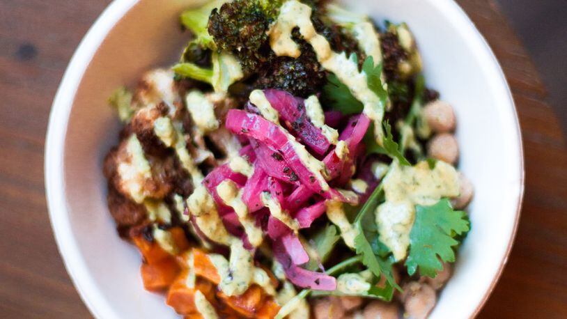 Piada's new Mediterranean Power Bowl, vegetarian and vegan friendly, offers a bold composition of flavors, and is topped with Piada’s special harissa and Greek yogurt drizzle.