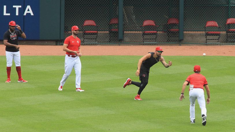 Reds outfielder Nick Castellanos participates in the first workout of Summer Camp on Friday, July 3, 2020, at Great American Ball Park in Cincinnati. David Jablonski/Staff