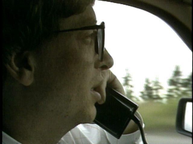 Bill Gates on cell phone from early days of Microsoft in Redmond