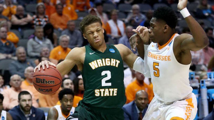 DALLAS, TX - MARCH 15: Everett Winchester #2 of the Wright State Raiders drives on Admiral Schofield #5 of the Tennessee Volunteers in the first half in the first round of the 2018 NCAA Men’s Basketball Tournament at American Airlines Center on March 15, 2018 in Dallas, Texas. (Photo by Ronald Martinez/Getty Images)