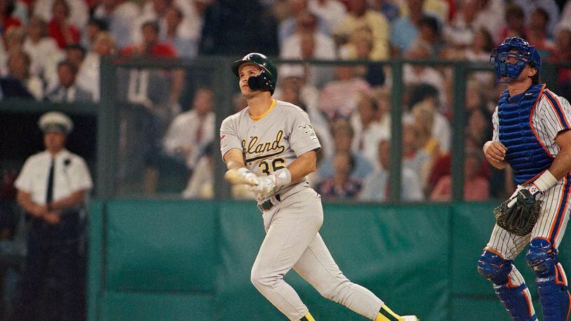Terry Steinbach of the Oakland A's watches a long fly ball in the fourth inning of on Tuesday, July 12, 1988 night's All-Star game in Cincinnati. Steinbach's sacrifice scored Dave Winfield of the New York Yankees for the American ague’s second run. (AP Photo/Gene Puskar)