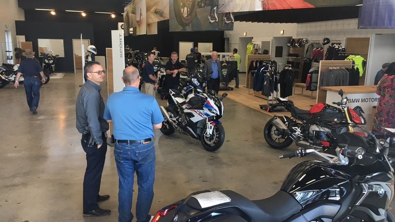 BMW Motorcycles of Greater Cincinnati held a ribbon-cutting at on Friday, June 28, 2019, for the new business at 140 N. Verity Parkway. ED RICHTER / STAFF
