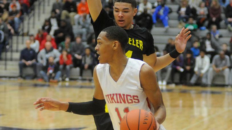 Princeton junior Darius Bazley (with ball) is committed to OSU. MARC PENDLETON / STAFF