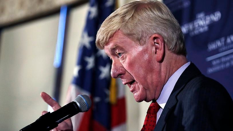 Former Massachusetts Gov. William Weld gestures during a New England Council 'Politics & Eggs' breakfast in Bedford, N.H., Friday, Feb. 15, 2019. Weld announced he's creating a presidential exploratory committee for a run in the 2020 election. (AP Photo/Charles Krupa)