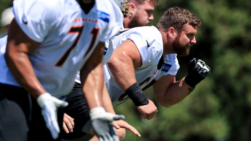 Cincinnati Bengals' Ted Karras participates in a drill during an NFL football practice in Cincinnati, Tuesday, May 17, 2022. (AP Photo/Aaron Doster)
