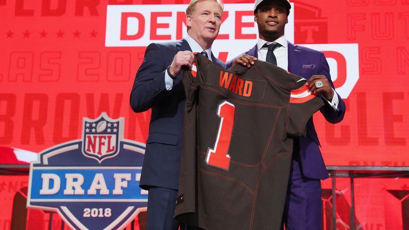 ARLINGTON, TX - APRIL 26:  Denzel Ward of Ohio State poses with NFL Commissioner Roger Goodell after being picked #4 overall by the Cleveland Browns during the first round of the 2018 NFL Draft at AT&T Stadium on April 26, 2018 in Arlington, Texas.  (Photo by Tom Pennington/Getty Images)