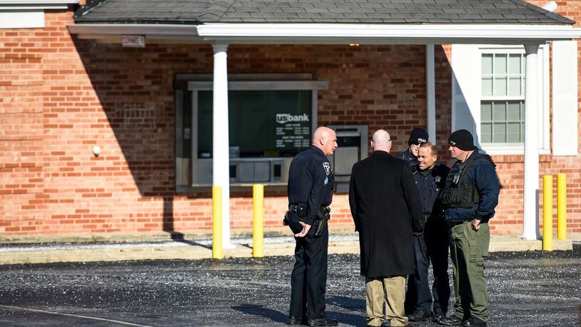 At about 1:55 p.m. Feb. 9, the U.S. Bank on North Main Street in Monroe, just a few blocks from the police station, was robbed by a man who displayed a gun, demanded money, and then fled with the cash, according to Monroe Police. NICK GRAHAM/STAFF