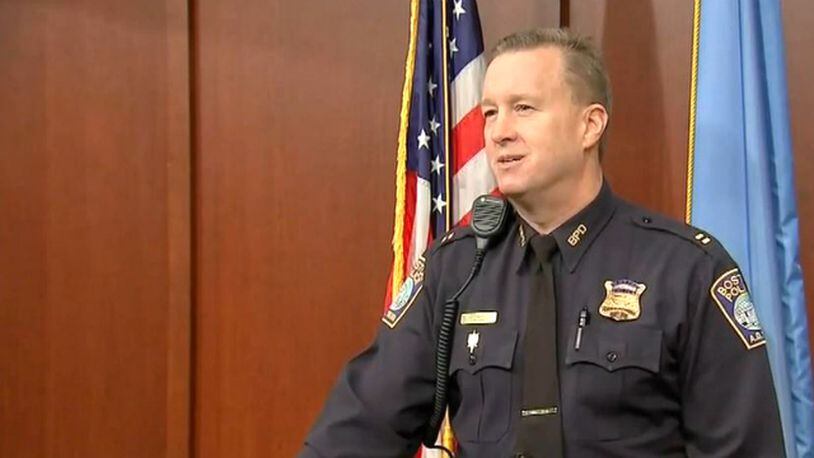 Boston police Capt. Kelley McCormick speaks to the media after he was praised for driving a family more than 100 miles to Portland, Maine, after they became stranded.