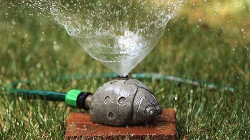 As happens most years, high July and August temperatures, plus increased lawn-watering, caused some Hamilton residents’ utility bills to at least double — and in some cases, increase by three or four times. STAFF FILE PHOTO