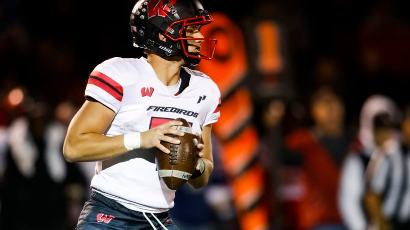Lakota West's Mitch Bolden looks to pass during their game against Fairfield. Lakota West defeated Fairfield 38-31 in double overtime in their football game Friday, Oct. 7, 2022 at Fairfield Stadium. NICK GRAHAM/STAFF