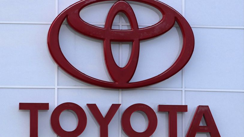 This Aug. 15, 2019 file photo shows the Toyota logo on a dealership in Manchester, N.H. (AP Photo/Charles Krupa, File)