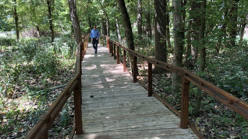 A lone walker tries out the boardwalk at the Ruder Preserve. The Three Valley Conservation Trust held a ribbon cutting for the walkway Oct. 6 but it had been completed and available for use before that. CONTRIBUTED