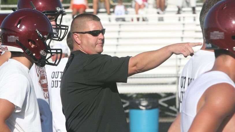 Lebanon coach Shawn Lamb instructs his quarterbacks during a 7-on-7 competition July 26, 2010, at James VanDeGrift Stadium in Lebanon. COX MEDIA FILE PHOTO