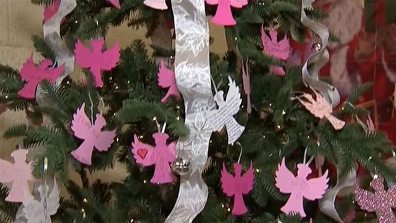 An Angel Tree is displayed at Our Lady of Grace School in Pittsburgh, Pennsylvania, during the Amy Fallert Memorial Santa Breakfast.