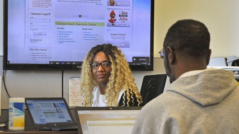 Danique Carter, a job coach at the Goodwill Easterseals, helps clients without internet get access to unemployment. MARSHALL GORBYSTAFF