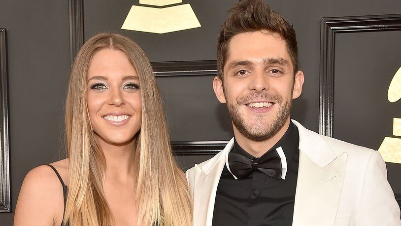 Singer Thomas Rhett and wife Lauren Akins announced that they are expecting two babies -- one is being adopted from a country in Africa and Atkins is pregnant with a child. (Photo by Alberto E. Rodriguez/Getty Images for NARAS)