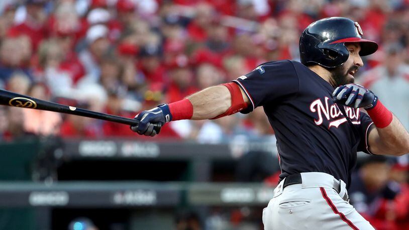 The Nationa's Adam Eaton hits a two-run RBI double during the eighth inning of game two of the National League Championship Series against the St. Louis Cardinals at Busch Stadium on October 12, 2019 in St Louis, Missouri. (Photo by Jamie Squire/Getty Images)