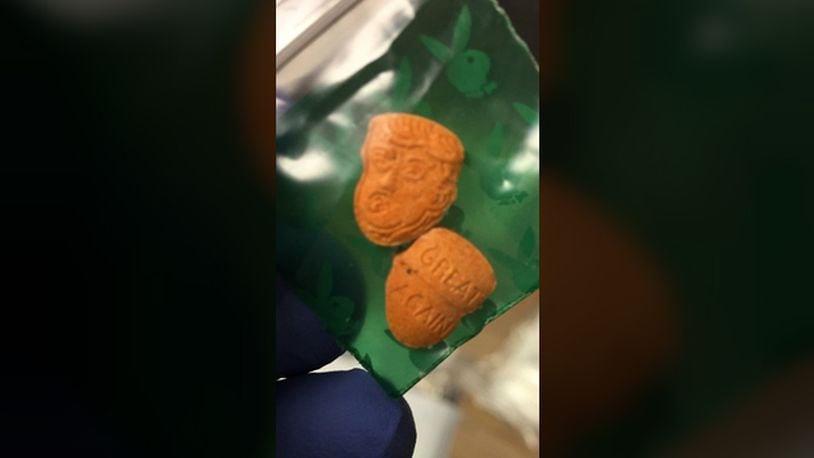 A photo released by Indiana State Police on Friday, June 29, 2018, shows pills ecstasy pills seized by authorities and shaped to look like President Donald Trump.