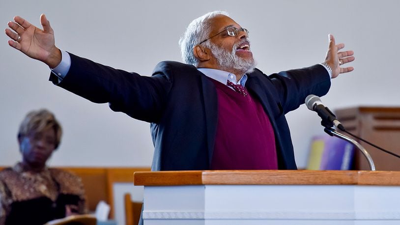 Reverend B. Wayne McLaughlin speaks during Hamilton's Martin Luther King, Jr. day annual program held Monday, Jan. 18 at Payne Chapel AME Church. A march that started at the Booker T. Washington Community Center was held before the program. NICK GRAHAM/STAFF