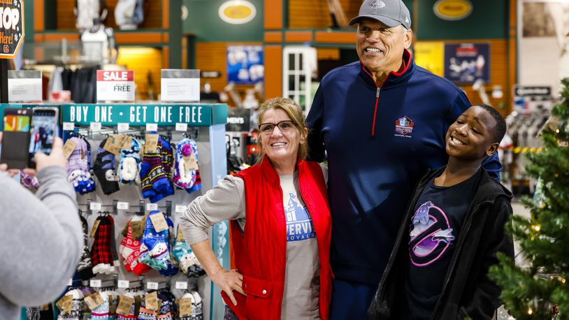 The Anthony Munoz Foundation partnered with a mentoring program from Hamilton's Riverview Elementary School and allowed kids to shop for themselves Friday, Dec. 17, 2021 At Dick's Sporting Goods in Fairfield Township. The students also received a $200 Kroger gift card for their families. NICK GRAHAM / STAFF