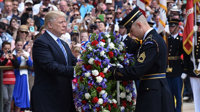 ARLINGTON, VA - MAY 29: President Donald Trump participates in a wreath-laying ceremony at the Tomb of the Unknown Soldier at Arlington National Cemetery on Memorial Day, May 29, 2017 in Arlington, Virginia. (Photo by Olivier Douliery - Pool/Getty Images)