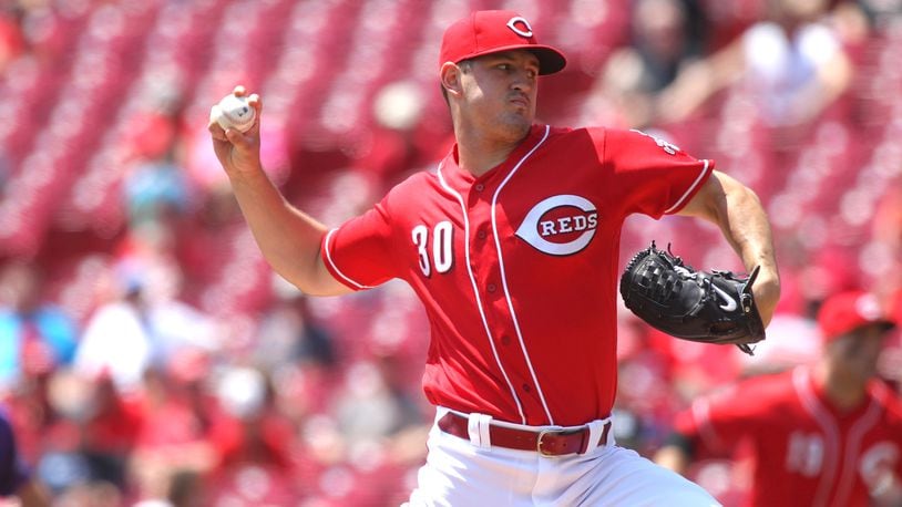 Reds starter Tyler Mahle pitches against the Rockies on Thursday, June 7, 2018, at Great American Ball Park in Cincinnati. The rookie right-hander went 3-0 in June with a 2.18 ERA. David Jablonski/Staff