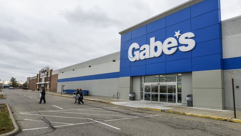 Shoppers exit Gabe’s department store, one of the tenants of the Towne Mall Galleria in Middletown. NICK GRAHAM/STAFF