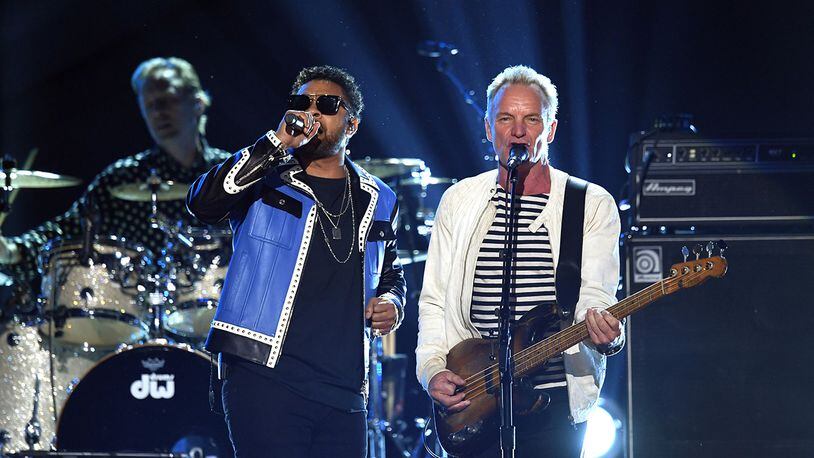 Recording artists Shaggy (L) and Sting are going ton a joint tour this fall. (Photo by Kevin Winter/Getty Images for NARAS)