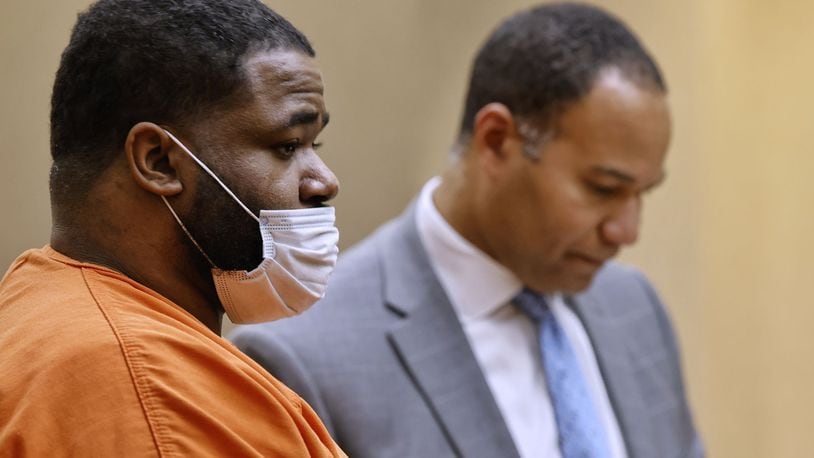 Mychel King, with attorney Lawrence Hawkins III, was sentenced to life in prison with opportunity for parole after 28 years in Butler County Common Pleas Court Thursday, Sept. 23, 2021 in Hamilton. King was found guilty in the 2016 death of Jaylon Knight. NICK GRAHAM / STAFF