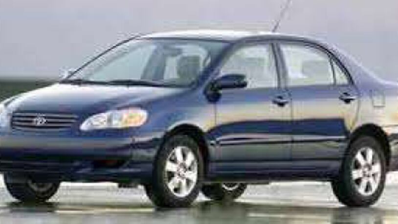 2003 blue Toyota Corolla (not actual suspect car)