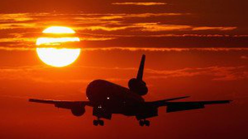 A plane comes in for a landing at Miami International Airport. (Getty Images)