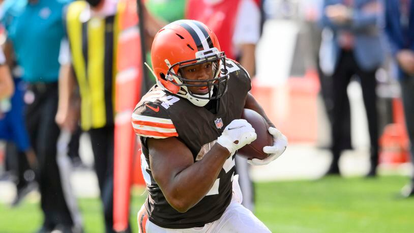 Cleveland Browns running back Nick Chubb rushes for a 20-yard touchdown during the second half of an NFL football game against the Washington Football Team, Sunday, Sept. 27, 2020, in Cleveland. (AP Photo/David Richard)