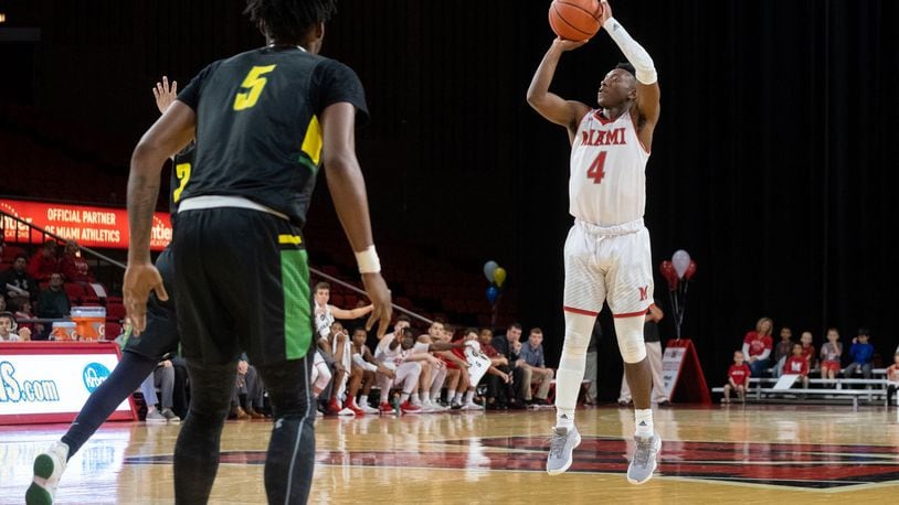 Miami’s Isaiah Coleman-Lands puts up a shot during a game last season. CONTRIBUTED