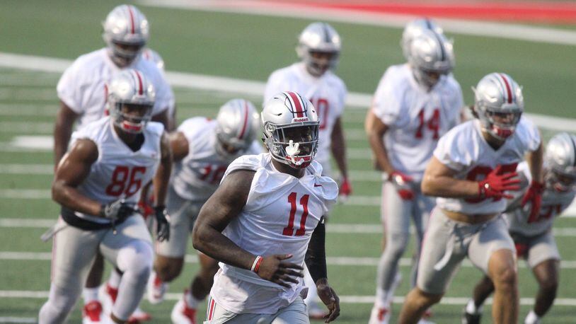 Ohio State’s Jalyn Holmes (11) practices on Thursday, July 27, 2017, at the Woody Hayes Athletic Center in Columbus. David Jablonski/Staff
