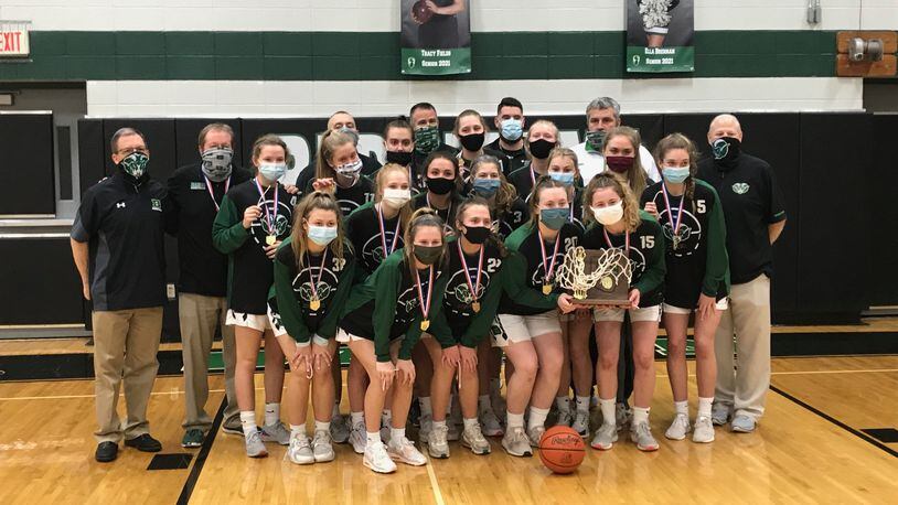 The Badin High School girls basketball team with their Division II district championship trophy. The Rams faced Columbus Bishop Hartley on Tuesday in the regional semifinals. CONTRIBUTED