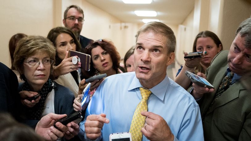 Rep. Jim Jordan (R-Ohio) is questioned by reporters in a Capitol Hill hallway, in Washington, June 26, 2018. Jordan is facing a slowly-percolating sexual misconduct scandal, as new accusers step forward by the day to say the wrestling coach-turned-politician was aware of allegations that an Ohio State University doctor fondled multiple students, but did nothing to stop it. (Erin Schaff/The New York Times)