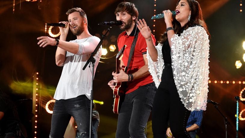 Charles Kelley, Dave Haywood and Hillary Scott of Lady Antebellum perform onstage at the 2017 CMA Music Festival on June 10 in Nashville. RICK DIAMOND/GETTY IMAGES